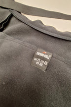 Wheelchair blanket with reflective elements and magnetic closure