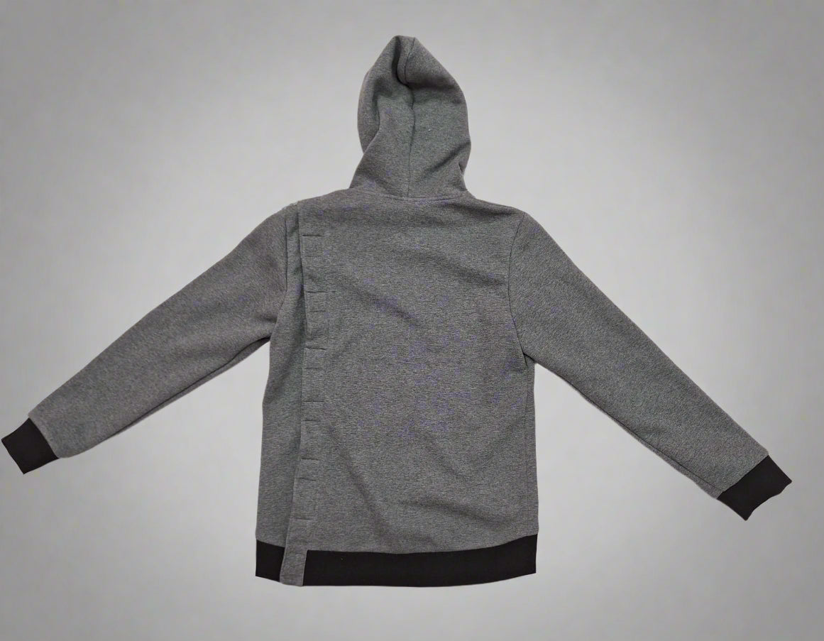 Adaptive hoodie in color grey made by Vilber's lying flat on surface, back view