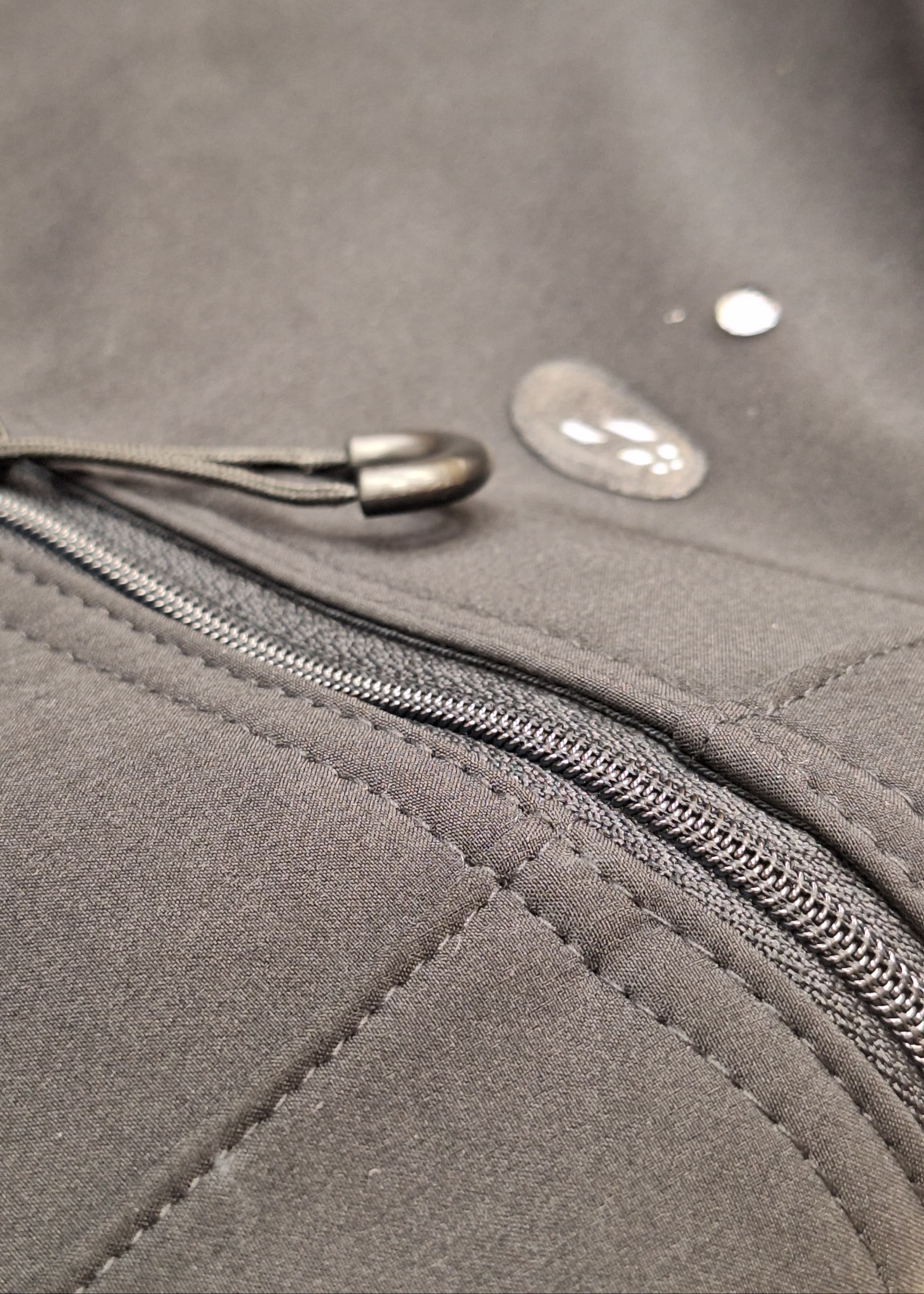 Wheelchair softshell pants close up look with water droplets on the material